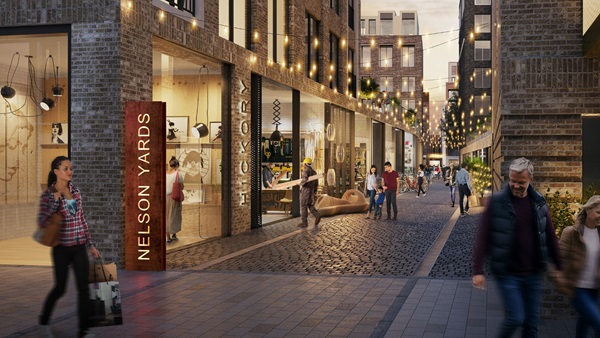 CGI render of mixed residential and retail buildings at dusk, with lights glowing in the street